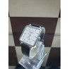 Montre Hermes en cuir noir